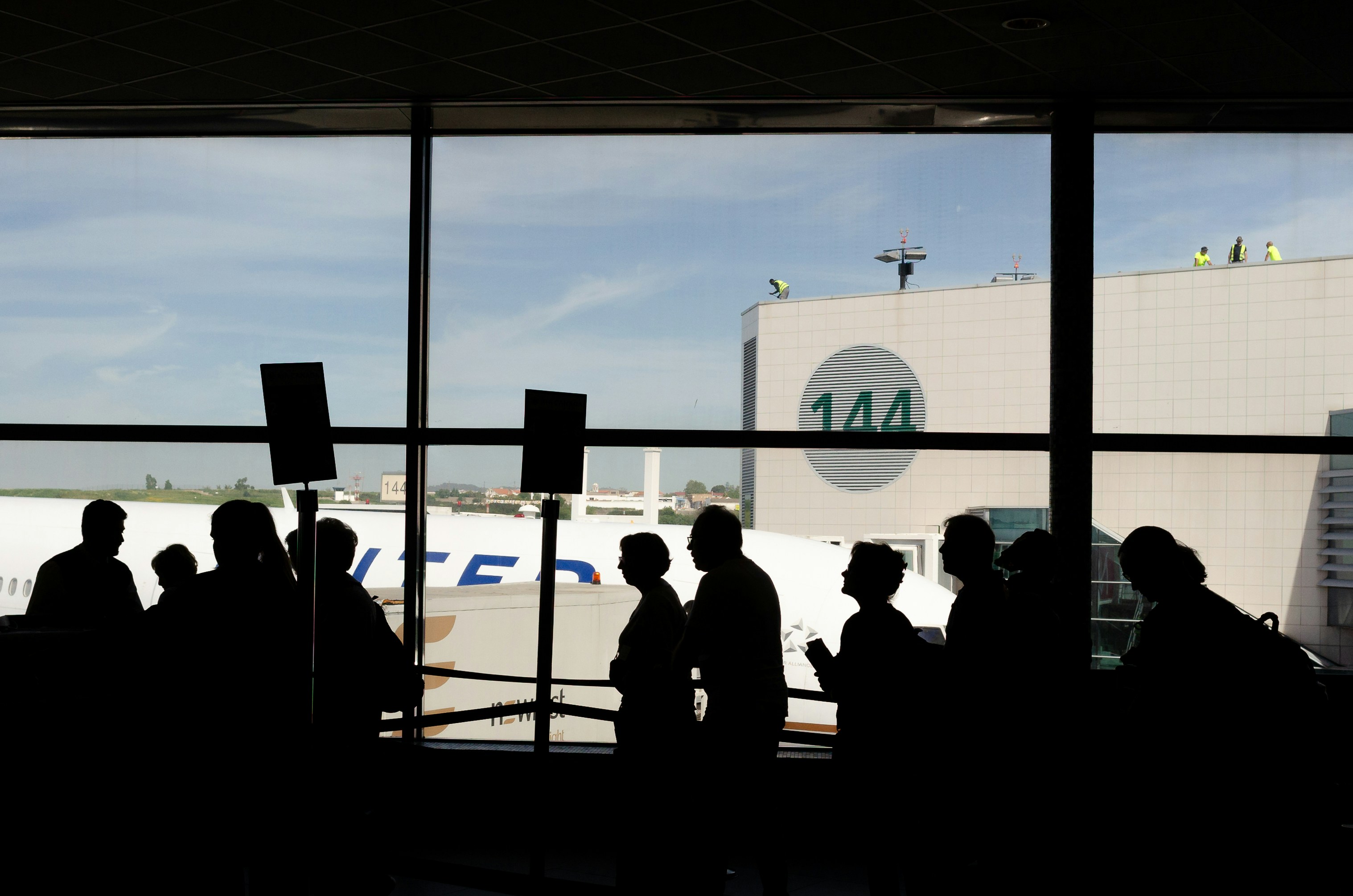 A group of people in the airport