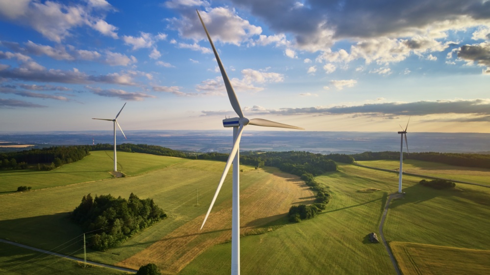 Wind turbines over fields