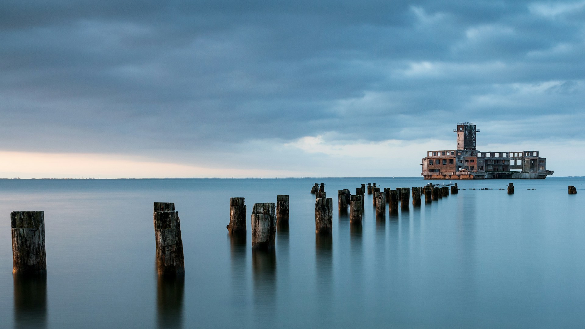 dock-wooden-base-on-water near Gdynia beach