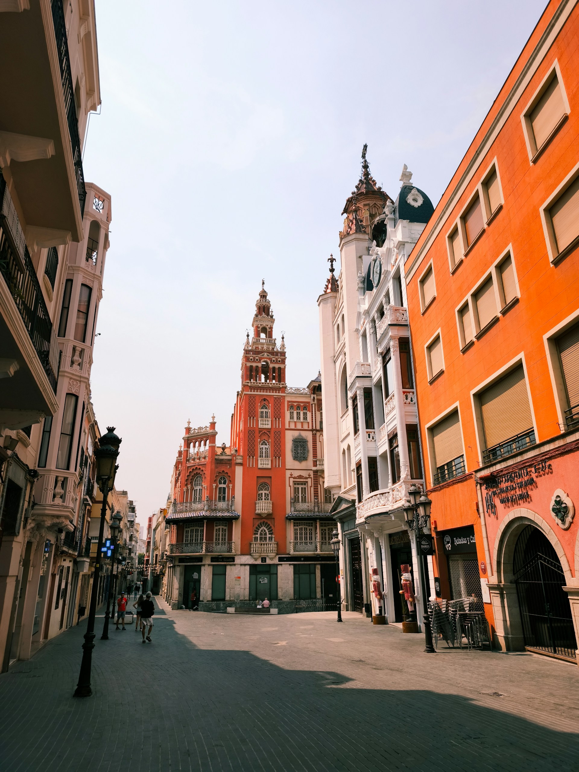 colorful-buildings-line-a-european-street-with-a-tower