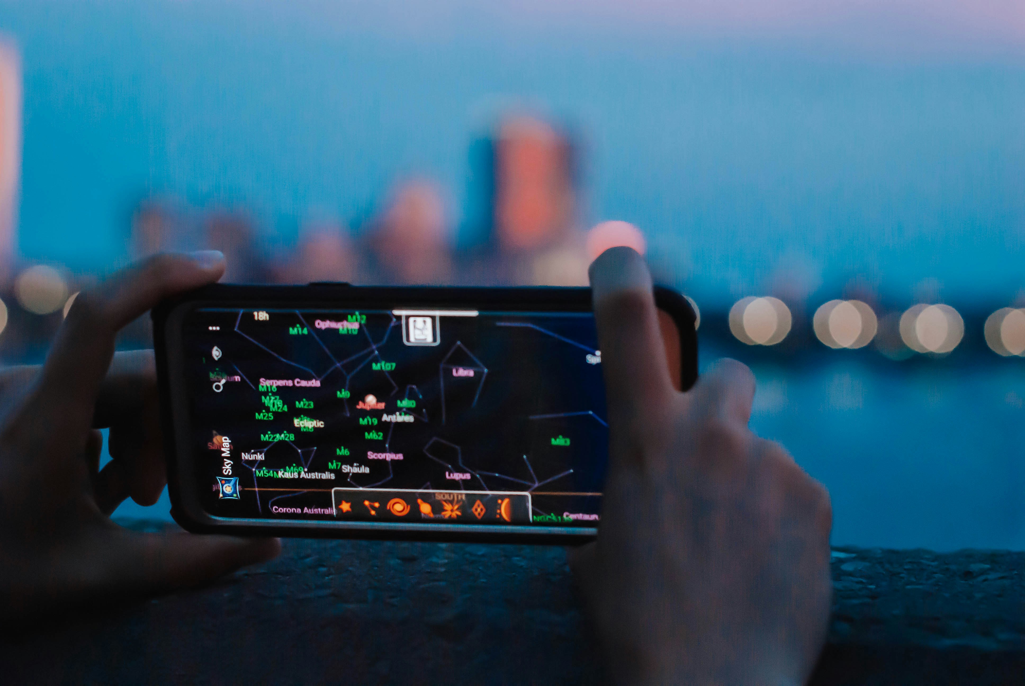 person-holding-black-android-smartphone