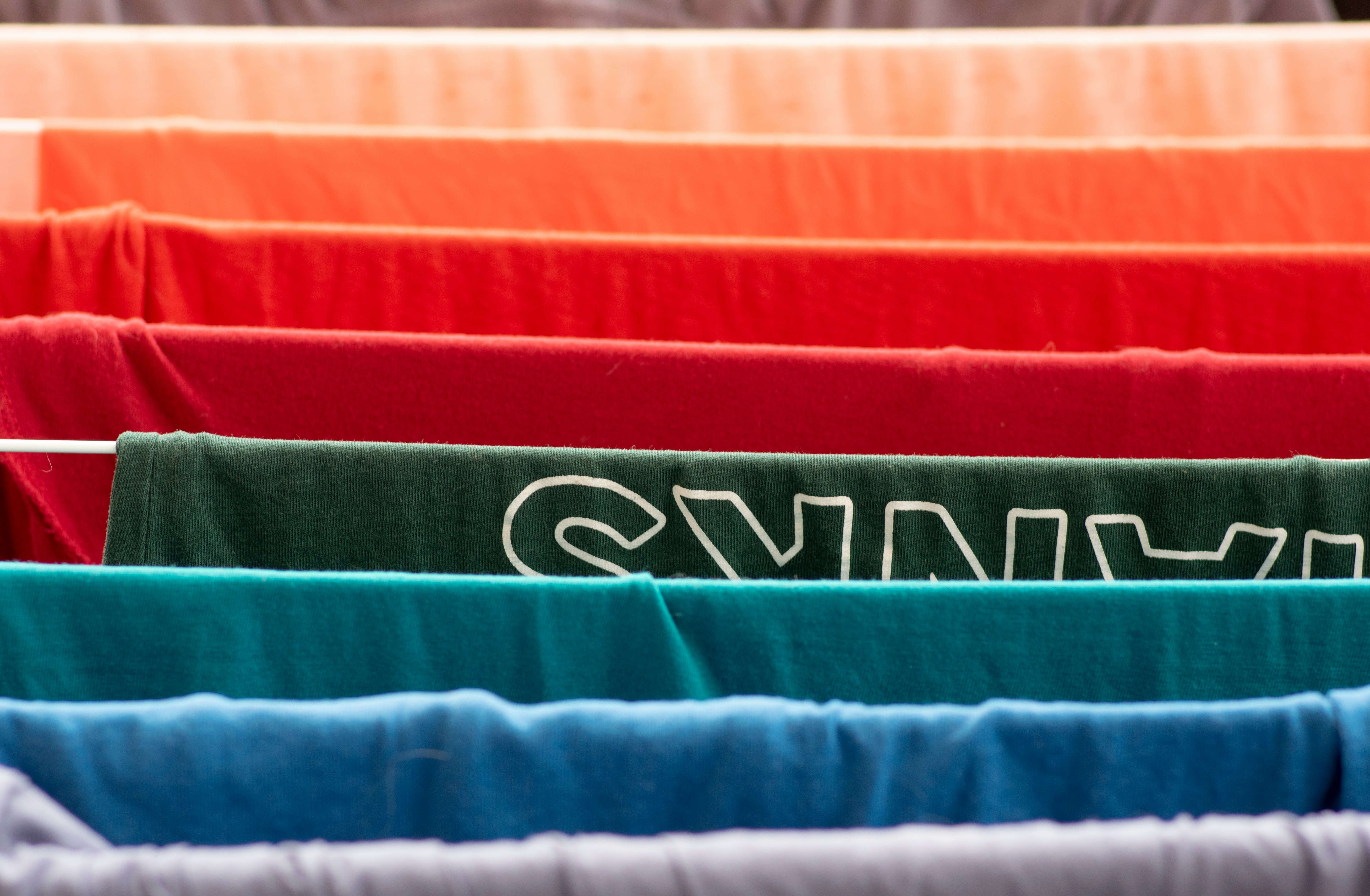 Close up of t-shirts drying. 