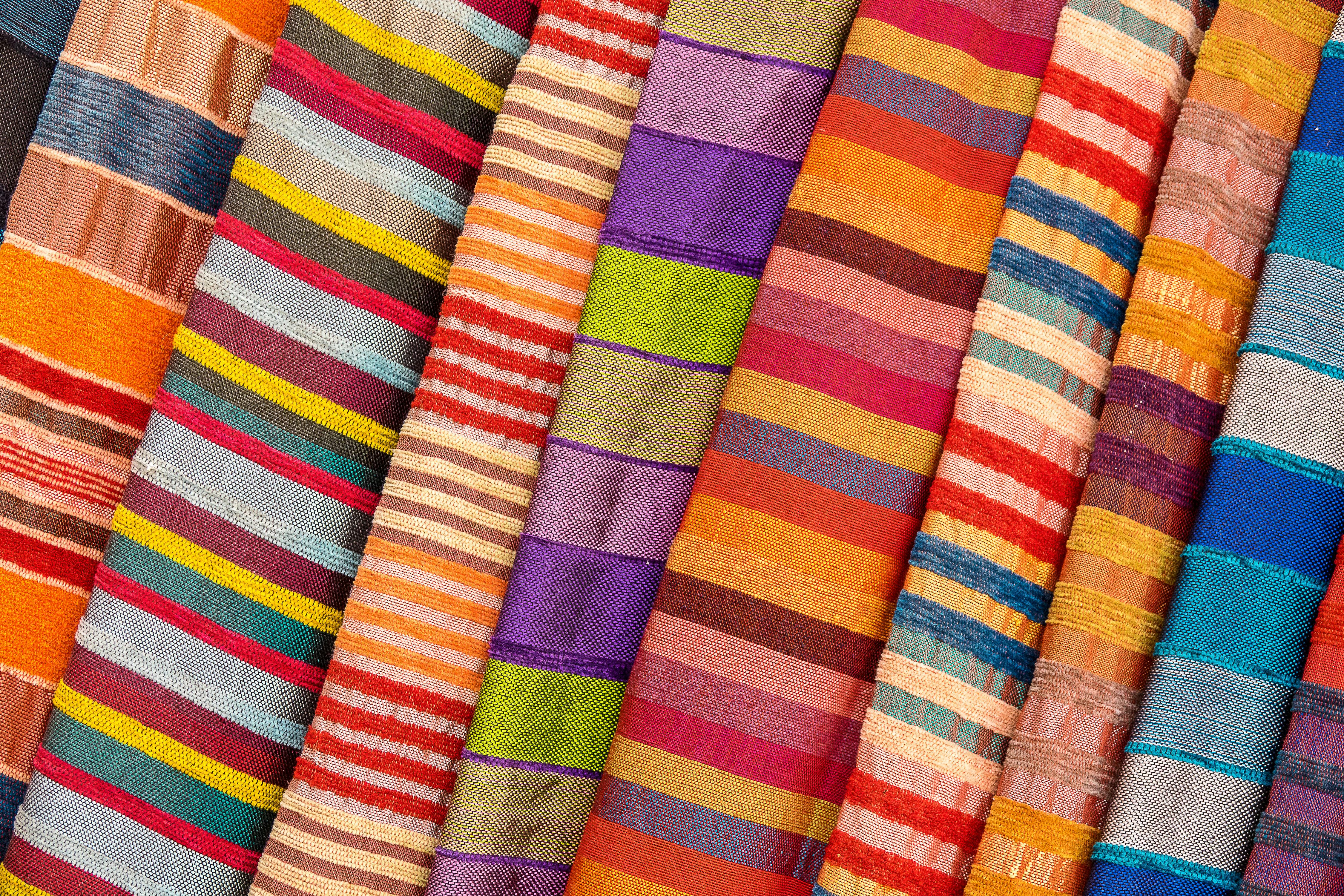 Colorful striped fabric in store.