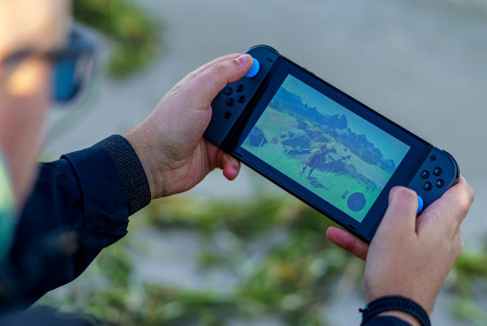 a-person-is-playing-a-video-game-on-a-cell-phone