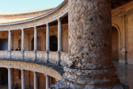 a-stone-column-and-a-balcony-structure
