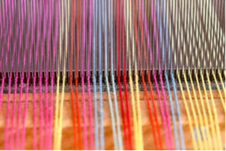 Loom close up with colorful threads