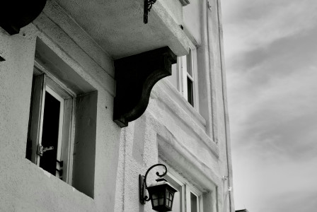 A picture presents a building with a Venice Beach Suites sign.