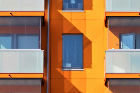 A photo presenting a block of flats.