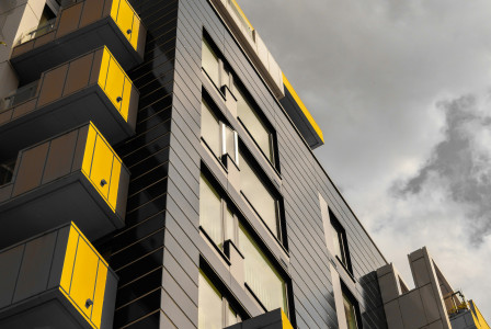 The picture presents a block of flats. 