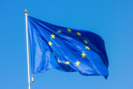 EU flag in front of blue sky