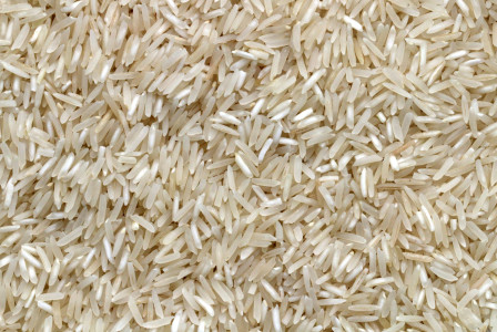 The photo presents a close-up of rice grains.