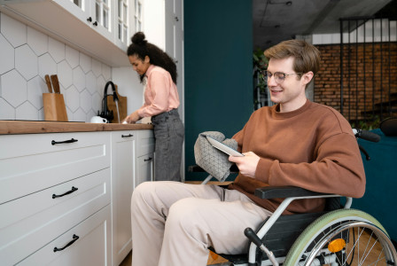 The pictures describe a person using a wheelchair in an accessible home environment.