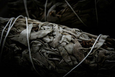 A pile of grey textile scraps and discarded fabric pieces.