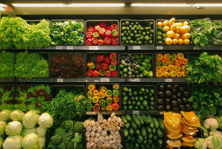 The picture presents vegetables in the boxes.