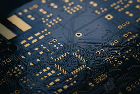 The photo presents a computer circuit board.