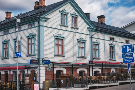 An illustrative photo of a large white building