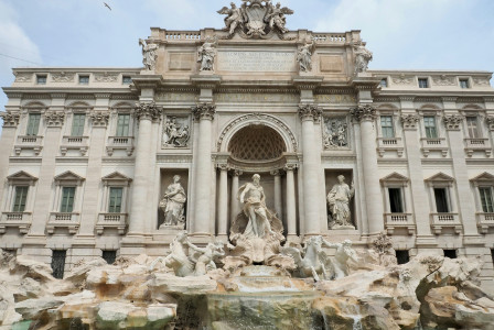 An illustrative photo of the Trevi fountain in the morning in Rome