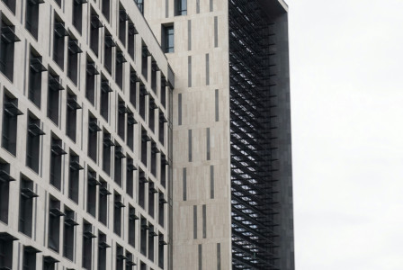 An illustrative photo of a brown concrete building