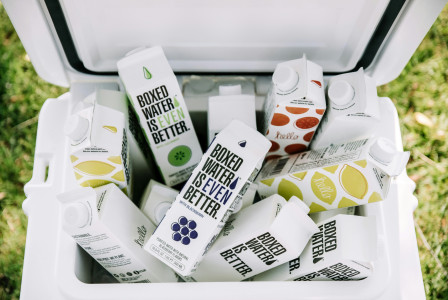 An illustrative photo of a trash bin with cartons