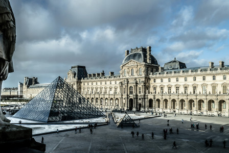 An illustrative photo of the Louvre Museum in Paris