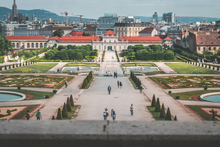 An illustrative photo of a group of people walking in a park