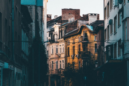 An illustrative photo of a narrow street in an urban environment