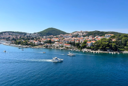 An illustrative photo of a boat near a city in Croatia