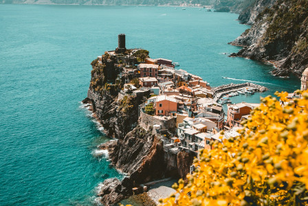 An illustrative photo of white houses on an island in Italy