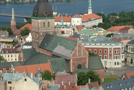 An illustrative photo of an aerial view of a cityscape with various buildings.