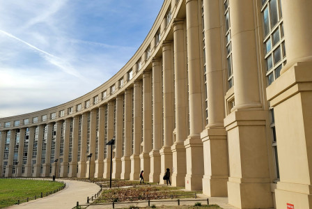 An illustrative photo of a large building with columns in France