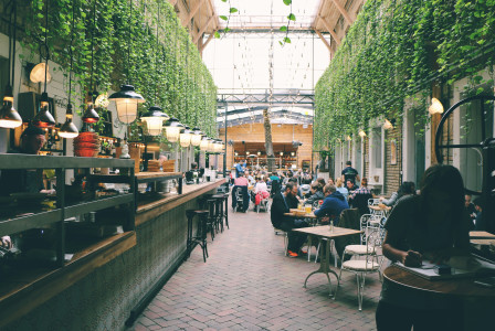 An illustrative photo of people sitting inside restaurant.