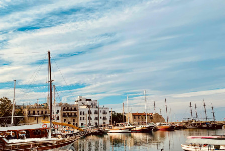An illustrative photo of a harbor with boats and yachts in Cyprus