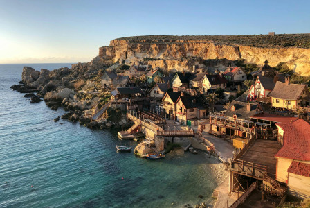 Photo by Pexels An illustrative photo buildings beside seashore.