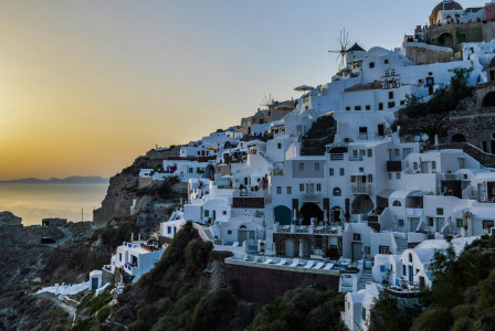 An illustrative photo of houses near the sea.