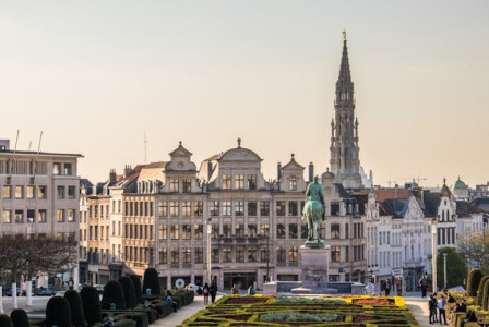 An illustrative photo of a high-rise building standing tall against the skyline