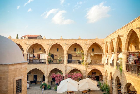 Photo by Pexels An illustrative photo of a courtyard surrounded by an arched gallery