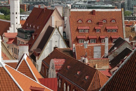 An illustrative photo of Estonian old town with traditional terracotta-roofed buildings