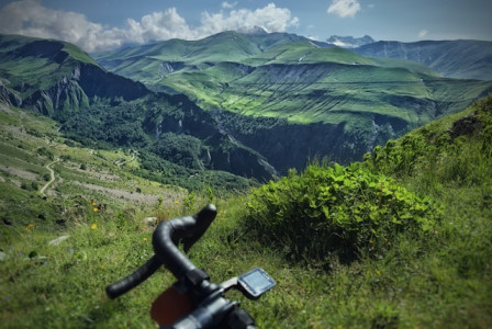 An illustrative photo of a bike parked in the mountains