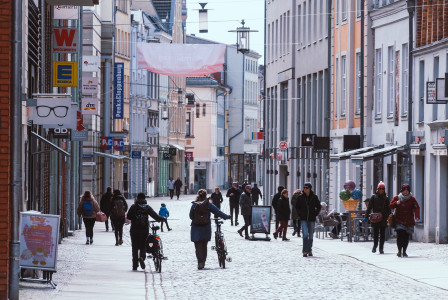 An illustrative photo of a shopping street pedestrian zone.