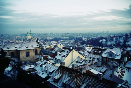 An illustrative photo of a winter cityscape with historic buildings in Czech Republic