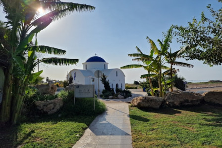 Photo by Unsplash An illustrative photo of a path leads to a white building.