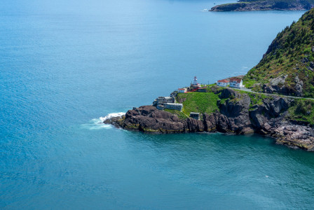 An illustrative photo of a small island in the middle of a body of water