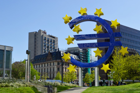 An illustrative photo of a large blue and yellow sign with stars