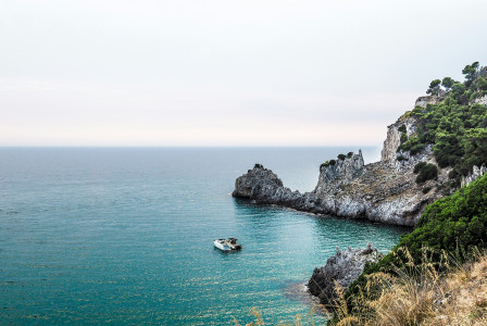 An illustrative photo of two boats near stone island