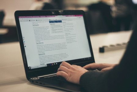 Photo by Unsplash An illustrative photo of a person typing on a laptop computer