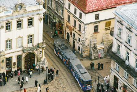 Photo by Unsplash An illustrative photo of a street with people and buildings.
