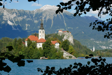 An illustrative photo of a castle on an island on lake bled in Slovenia.