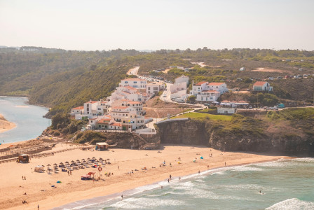 Photo by Pexels An illustrative photo of a coastal landscape with a sandy beach.