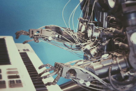 An illustrative photo of a robot playing a piano
