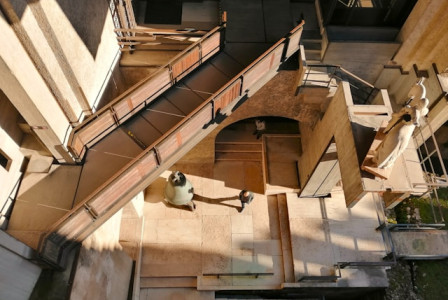 An illustrative photo of a building with a grand staircase